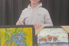 Jason Rowan with encaustic paintings